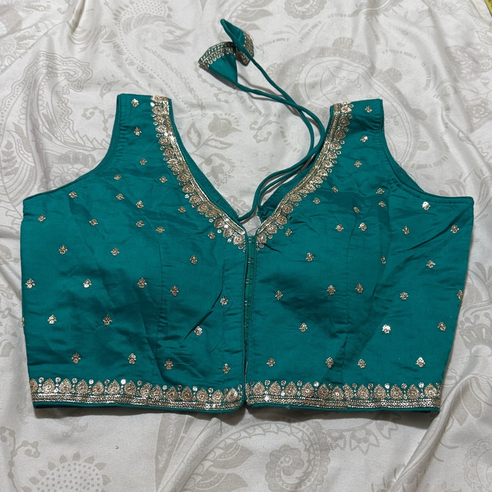 Teal Embellished Sleeveless Blouse